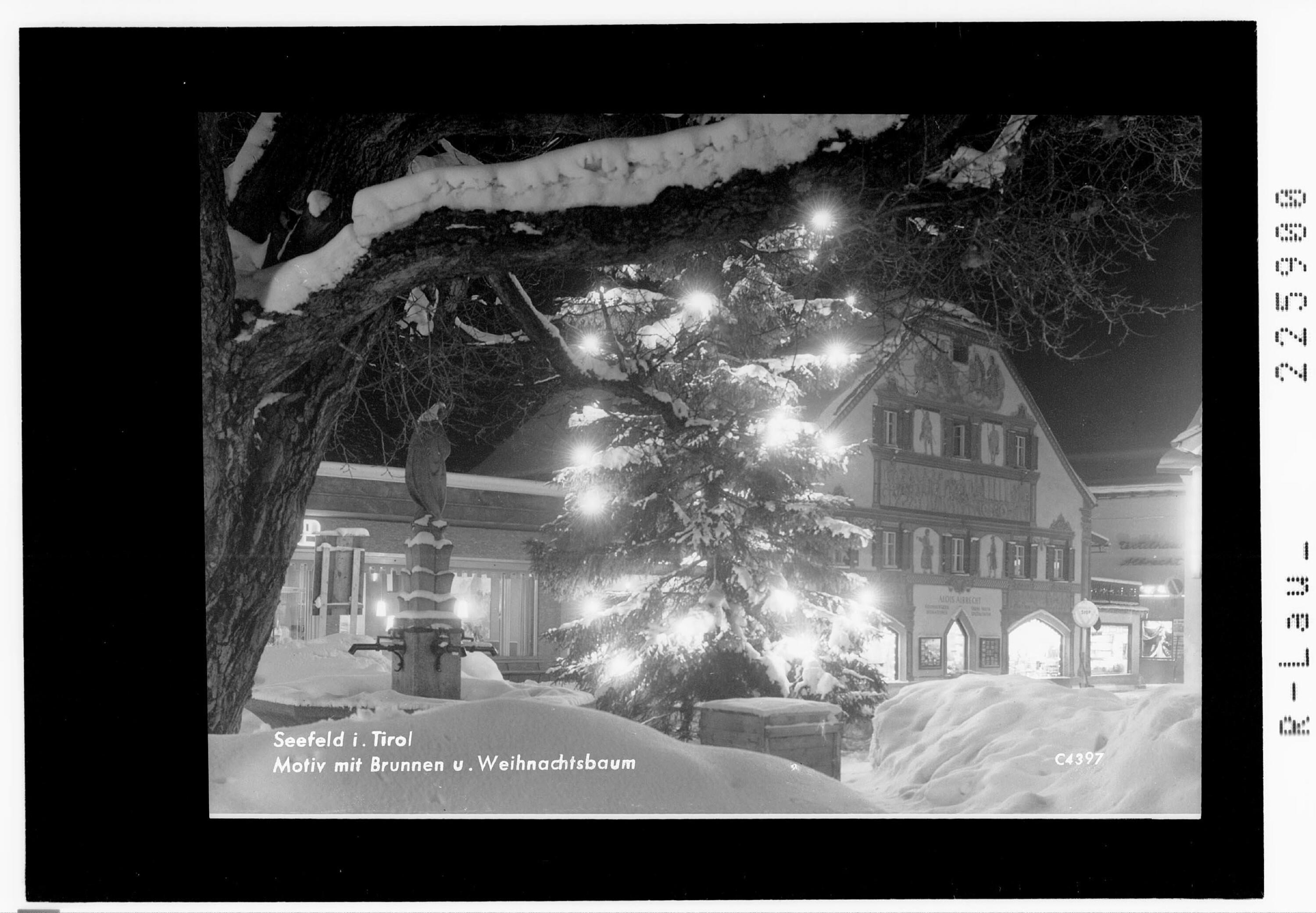 Seefeld in Tirol / Motiv mit Brunnen und Weihnachtsbaum></div>


    <hr>
    <div class=